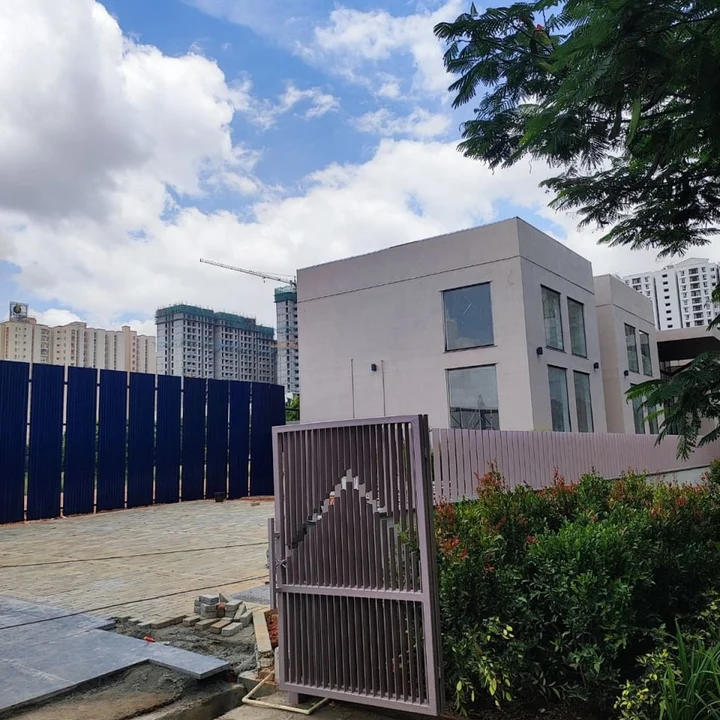 Entrance gate and completed block beside the Sattva KIADB site, Bagalur